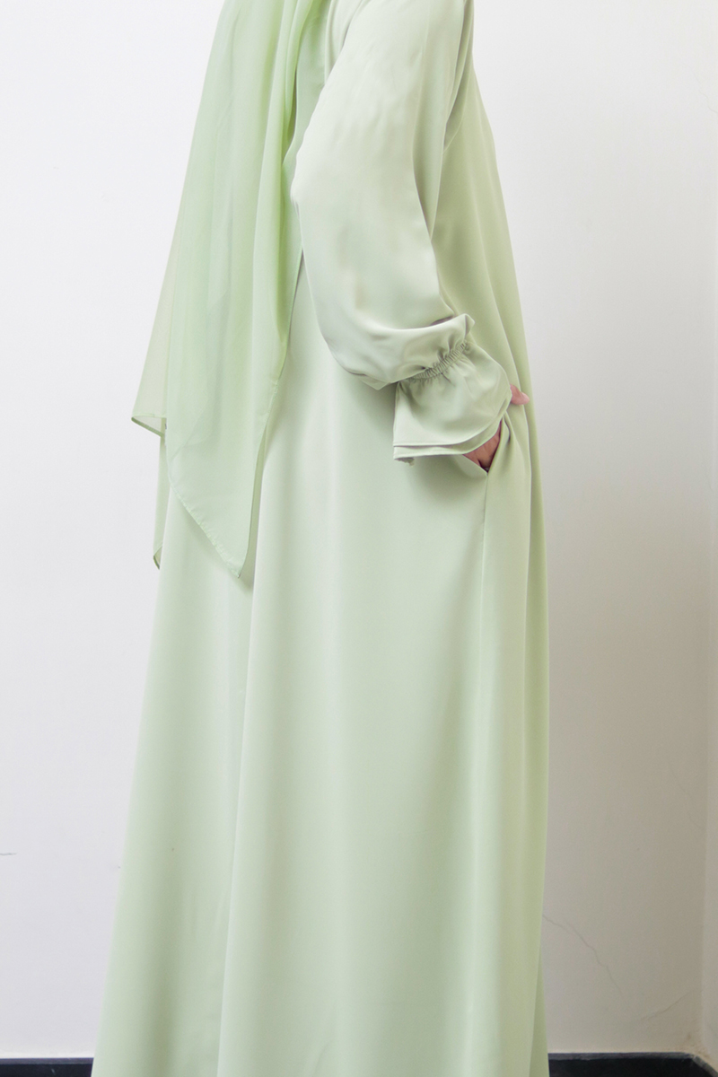 Pistachio Gelato Petal Buttoned Abaya 9 Pistachio Gelato Petal Buttoned Abaya - Image 9